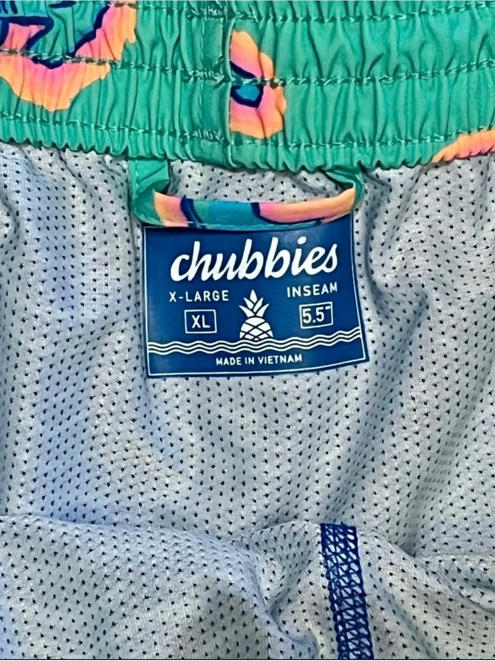 chubbies Teal Swim Trunks with Pink & Blue Shark Outline Print